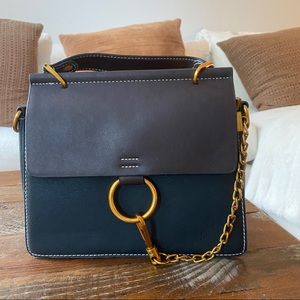 Navy and brown top handle bag